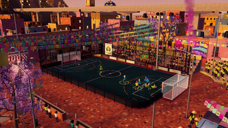 A dark court in a square of painted houses, strings of paper flags overhead, a crowd along the fence.